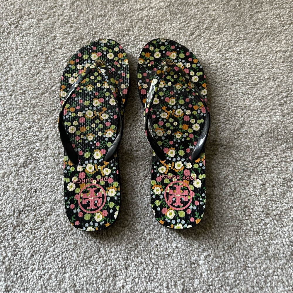 Tory Burch floral flip flops perfect condition.